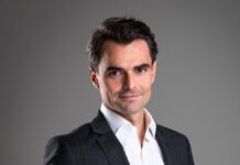 MCI Capital chce aktywnie inwestować w sektorze medycznym tobiasz jankowski. młody mężczyzna w garniturze